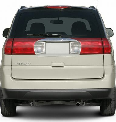 Rear view with distinctive tail lights and rear window wiper