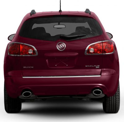 Rear view with dual exhausts, roof rails, and distinct taillights