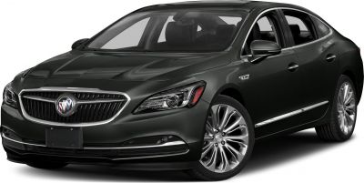Front angle view with grille and alloy wheels