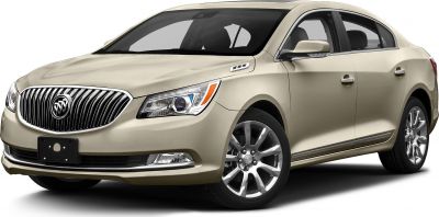 Front three-quarter view of beige sedan with chrome grille and alloy wheels