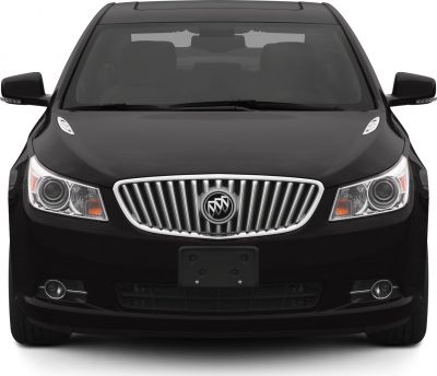 Front view with vertical-bar grille and twin headlights