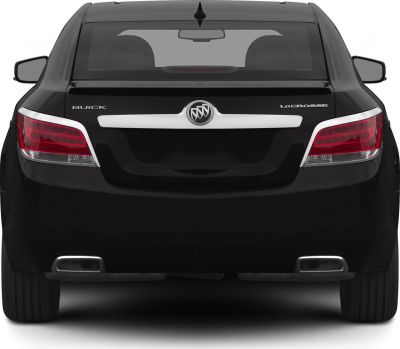 Rear view showing tail lights, dual exhaust outlets, and rear window.