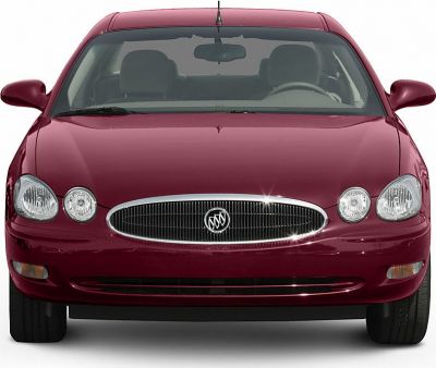 Front view with chrome grille and quad rounded headlights