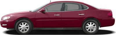 Four-door sedan profile with alloy wheels and chrome door handles