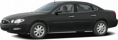 Side and front view of a 4-door sedan with oval headlights.