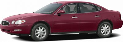 Side profile of a mid-size sedan with smooth lines and round headlights.