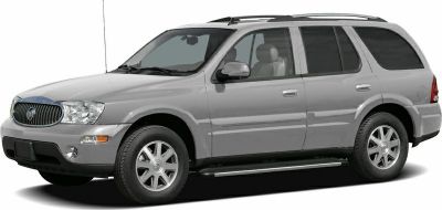 Silver SUV front side profile with alloy wheels and roof rails