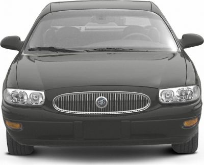 Front view showing vertical grille and dual headlights