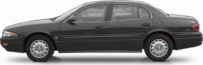 Side profile of a full-size sedan with alloy wheels and smooth body lines