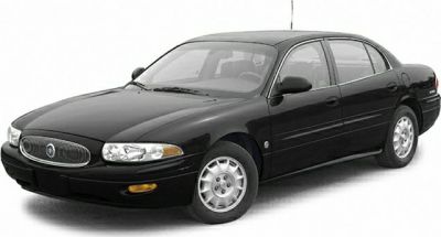 Black four-door sedan showing front side profile with rounded design.