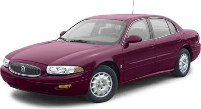 Oval front grille, classic alloy wheels, smooth sedan body