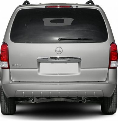 Rear view of a minivan with taillights, rear window, and emblem.