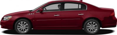 Side profile of a sedan with chrome side trim and alloy wheels.