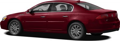 Side view of red sedan with chrome wheels and smooth body lines