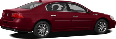 Side profile of a sedan with chrome multi-spoke wheels and rear spoiler