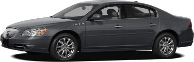 Gray sedan with chrome wheels and prominent front grille