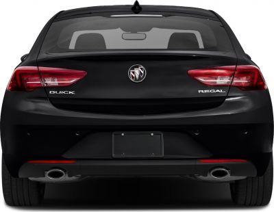 Dual exhausts and sleek taillights on a mid-size sedan rear view.
