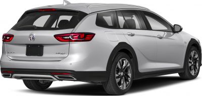 Rear side view of silver wagon with taillights and dual exhausts