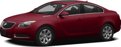 Front side view of a red sedan with alloy wheels and aerodynamic design