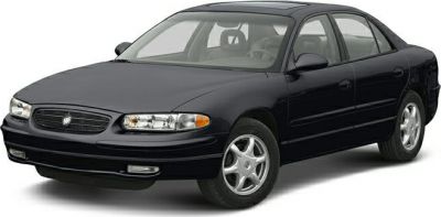 Front three-quarter view of a black four-door sedan with alloy wheels.