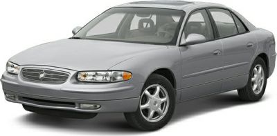 Silver sedan front side view with five-spoke wheels