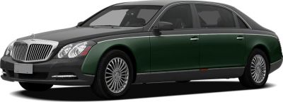 Green luxury sedan with chrome grille and elegant wheels side profile