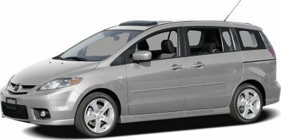 Silver minivan with sliding doors and alloy wheels viewed from the side
