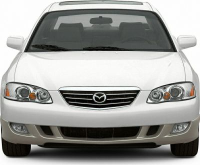 Front view of a sedan with distinctive grille and dual headlights.