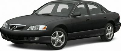 Sleek black four-door sedan with sporty alloy wheels and refined headlights