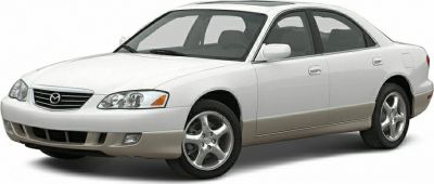 Front-side view of a dual-tone four-door sedan with alloy wheels
