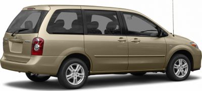 Sliding door minivan rear and side view with alloy wheels