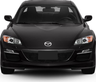 Sporty coupe front with sleek headlights and aggressive grille