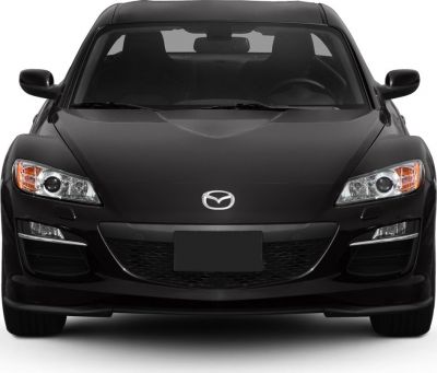 Front view of a sleek sports car with sharp headlights and aerodynamic hood