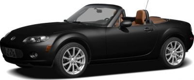 Black convertible with brown leather seats and alloy wheels
