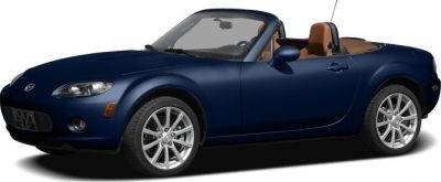 Blue convertible roadster with tan leather interior, sleek side profile.