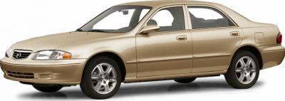 Four-door mid-size sedan with alloy wheels and classic 1990s design.