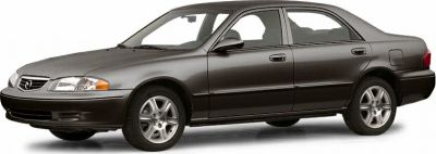 Side profile of a mid-size sedan with alloy wheels and smooth body design