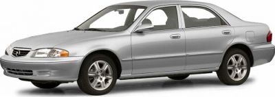 Silver four-door sedan with alloy wheels and aerodynamic body