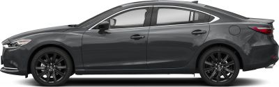 Side profile of a sleek sedan with black alloy wheels and refined window trim