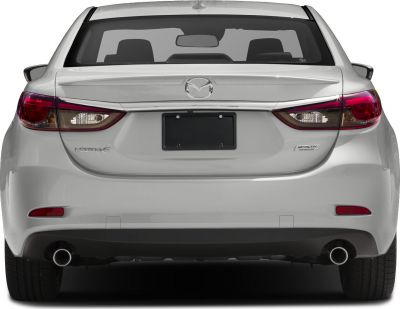 Rear view with dual exhaust and modern tail lights.