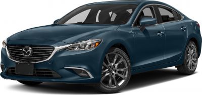 Front-side view with detailed headlights, grille, and alloy wheels