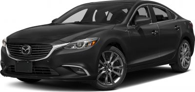 Front side view of a sleek sedan with modern headlights and alloy wheels