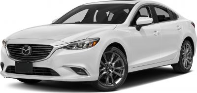 Front grille and alloy wheels of white sedan