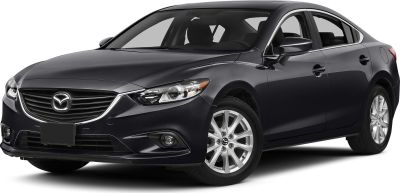 Sharp front grille and alloy wheels of a sleek mid-size sedan