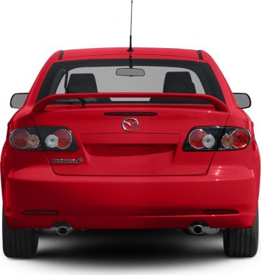 Red hatchback rear with dual exhaust and spoiler
