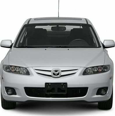 Front view with headlights, grille, and fog lights in facelift hatchback.