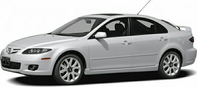 Side profile and alloy wheels of a 2005 hatchback