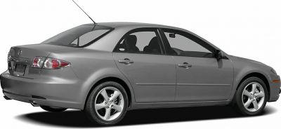Rear and side profile of a mid-2000s sedan with alloy wheels