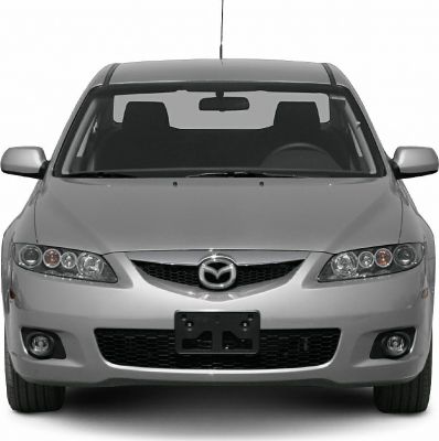 Front view of a sedan with distinctive headlights, grille, and fog lights