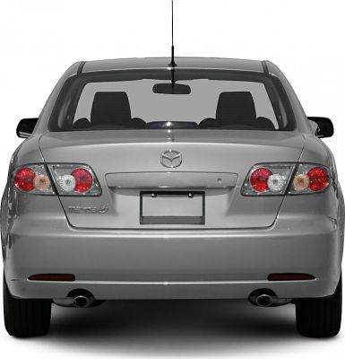 Rear view with tail lights, dual exhaust pipes, and trunk details